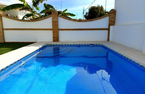 Chalet adosado con piscina privada en Mazagón - Foto 17