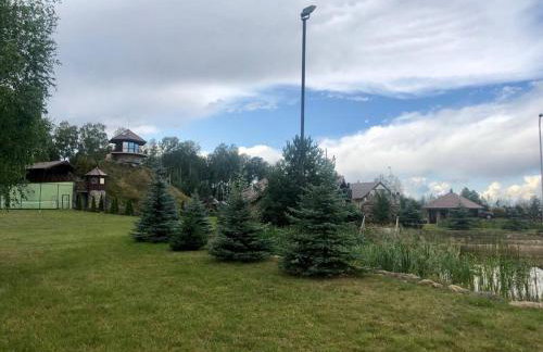 Dom nad stawem przy lesie - Foto 17