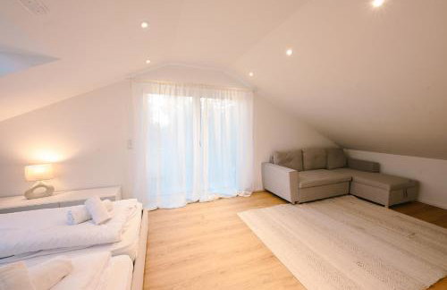 Liboria I Stylische Maisonette Wohnung Alpenblick I 4min zum See - Foto 24