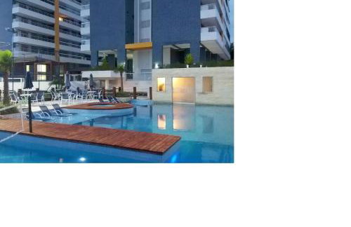 Apto pé-na-areia em Bertioga - Indaia Home Club - Foto 4