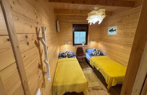 Domki przy jeziorze z prywatną plażą w Borach Tucholskich Pensjonat Alicja wczasy z dziećmi nowe luksusowe domki na skraju jeziora i lasu - Foto 37