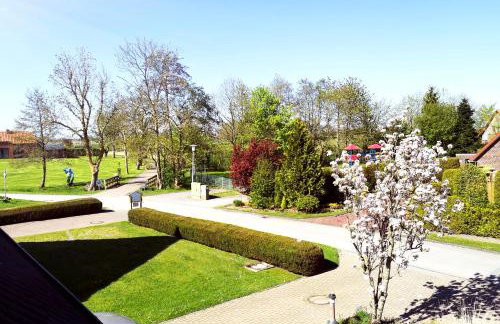 Haus Meereswind Esens, Wintergarten mit Kamin - Foto 14