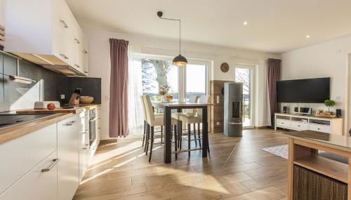 5 Sterne Ferienhaus direkt am See mit Sauna-Kamin-Garten - Foto 3