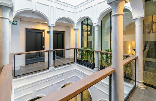 Aquitania Home Suites - Photo 15