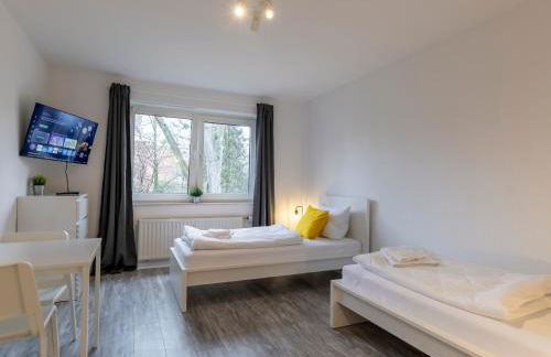 BudgetRoom Modernes Apartment mit 3 Schlafzimmern - Foto 16