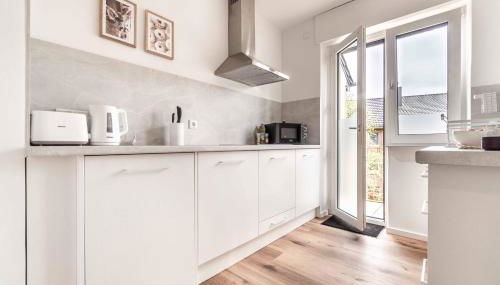 MODERN & MINIMAL - Design-Apartment in Stadtmitte - Foto 5, stove, toaster