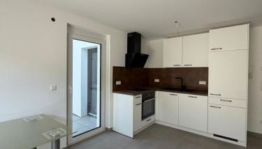 Moderne 2-Zimmer-Wohnung mit großer Terrasse und eigenem Stellplatz - Foto 4