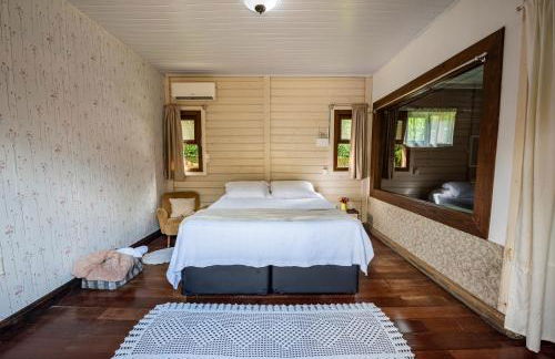 Casa Rústica com Piscina Privativa, Banheira de Hidromassagem, Ar-Condicionado, Pet friendly - Refúgio na Natureza a 5 Minutos do Centro de Imbituba, Perfeita para Famílias e Grupos - Photo 30