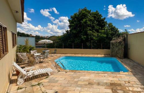 Casa com Piscina no Centro - 13 pessoas - Churrasqueira - Elegante - Foto 1