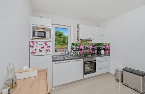Holiday house "Sabine pink" with heated pool - Photo 13