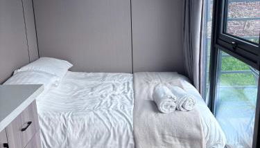 Glamping Pod with a Hot Tub in Orchard - Foto 4, towels