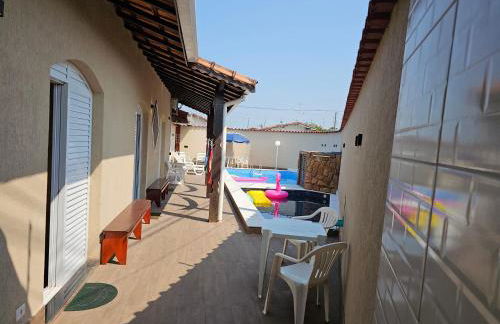 Casa Lindíssima e Espaçosa com 2 Piscinas - Adulto e Infantil, Perto da Praia, Opção da Piscina Adulto Aquecida Cobrado à Parte, 4 Quartos Frente as Piscinas, Área Gourmet Completa com Churrasqueira, Forno e Fogão a Lenha, Mesa de Bilhar, Lareira na Sala - Photo 42