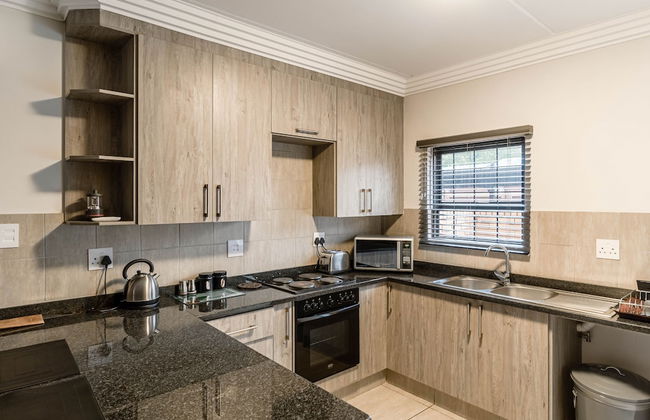 Camelot Guest House & Apartments - Foto 24