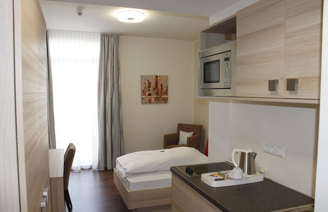 Prime 20 Serviced Apartments - Foto 10