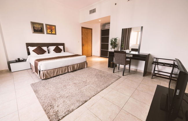 Magnum Hotel & Suites West Bay - Foto 10