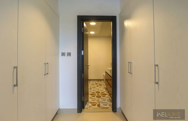 WelHome - Prime 1BR Apartment at Oia Residence - Photo 7