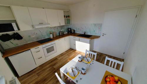 geräumige, moderne Ferienwohnung mit PKW- und Fahrradstellplatz - FeWo Nordland - Foto 4, stove, dishwasher