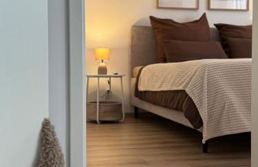 Modernes 2-Zi Apartment mit Terrasse und Garten - Foto 16