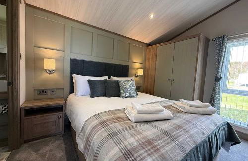 Highland Holiday Getaways - The Heilan' Lodge - Foto 15