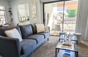 Poolside 2BR Condo with Balcony & Workspace - Photo 15