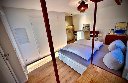 Stylisches See-Studio mit Badezugang & Garten - Photo 29