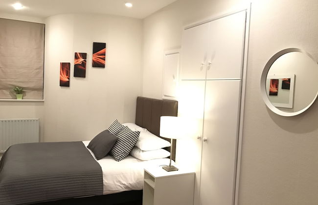 SHQ Apartments - Photo 14