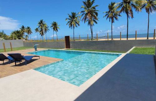 Piscina aquecida, 5 suítes e pé na areia com vista espetacular!! - Photo 9