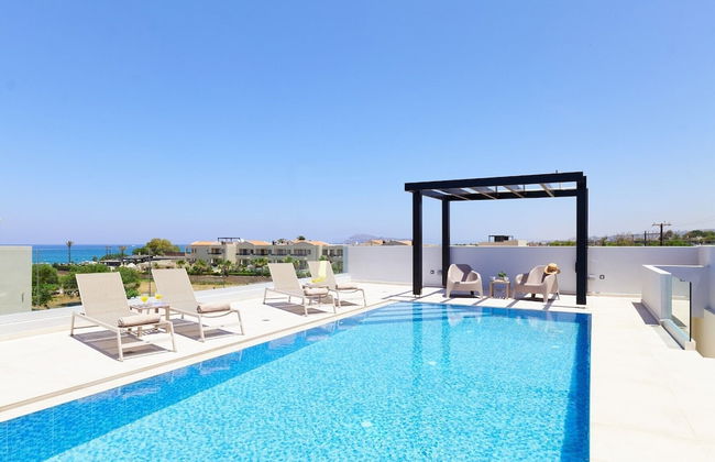 Beach Sand Villas - Beachfront Rooftop Pool - Photo 19