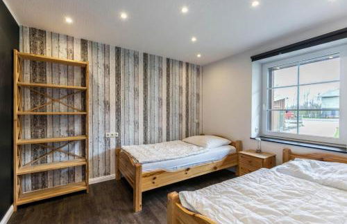 Modernes Holzhaus mit traumhaftem Deichblick - Foto 18