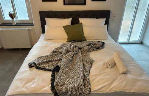 FeWo - EG Apartment Mosel- & Weinquartier, Terrasse, Parkplatz, moderne Küche bis 4 Personen - Foto 11