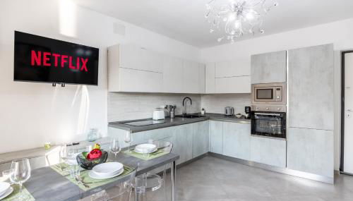 6 MINUTI AIRPORT ORIO AL SERIO, VISTA FIUME E Wifi - Photo 4, stove, dishwasher, pet friendly, toaster, minibar