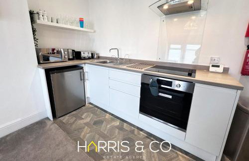 New Sandpiper Apartments - Foto 1