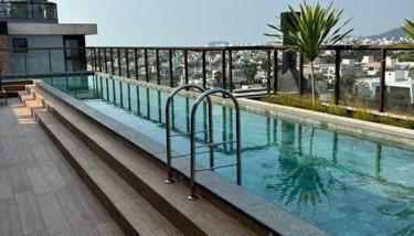 Apto Elegante com Localização Privilegiada e Rooftop incrível - Foto 1