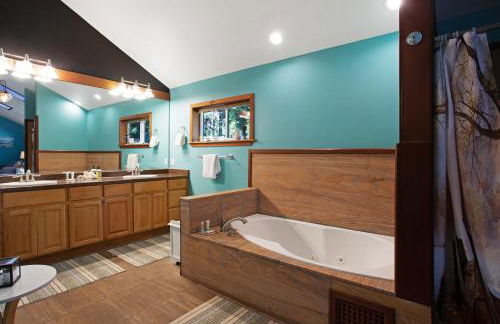 Tree-lined Home with Hot Tub Firepit & Large Yard - Photo 16