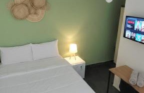 Suíte confortável e econômica perto de tudo - Foto 1