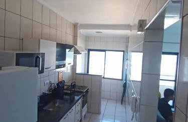 Apartamento pé na areia com sacada e garagem 2 banheiros - Photo 12