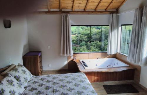 Hospedagem Colinas Chalé 2 - Foto 17