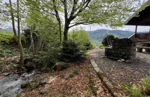 Chalet entier, vue panoramique, ruisseau et sauna. - Foto 35