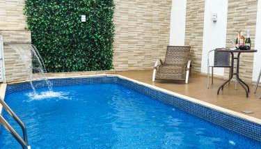 Casa na Praia, Piscina, Cascata, Churrasqueira, 2 Vaga carro, Redes de descanso - Foto 2, sunbed