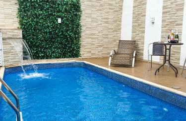 Casa na Praia, Piscina, Cascata, Churrasqueira, 2 Vaga carro, Redes de descanso - Foto 2