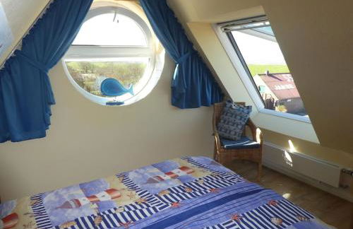 Ferienwohnung Inselblick Norddeich mit Meerblick - Foto 17