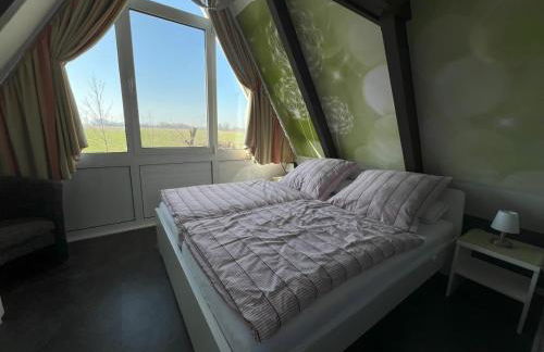 Nurdachhaus mit Blick ins Grüne- ruhige Lage nahe Yachthafen Fedderwardersiel - Foto 12