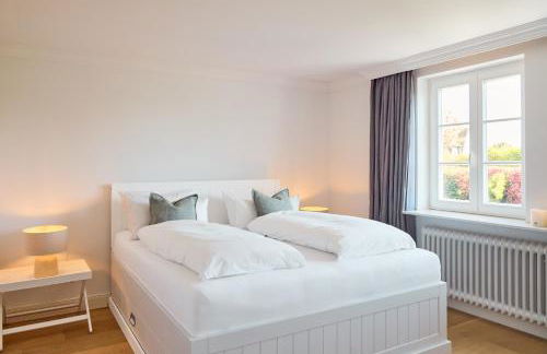 Reethüs Keitum mit Kamin und Südgarten in direkter Wattnähe - Foto 11