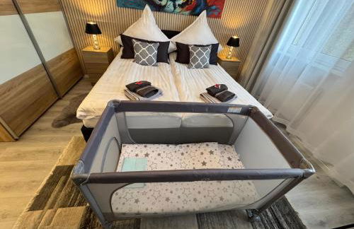 Familienfreundliche geräumige Design-Wohnung mit Balkon im Zentrum - APOLONIAliving - Foto 8