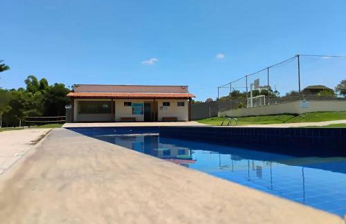 Casa 2 qts em condomínio, 15 min do Moto GP - Foto 1