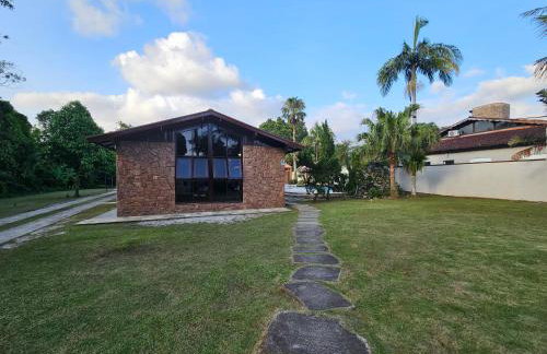 Casa Enorme para 12 pessoas, 4 suites e um fundo com 18mil metros de mata e um pier no rio que sai para o mar-Internet 100MB - Photo 9