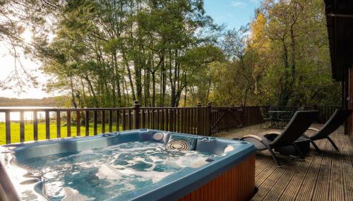 Dunnock Lodge with Hot-tub - Foto 2, sunbed