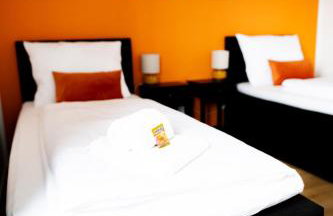 C4S -COME4STAY -InnHarmony- Stilvoll eingerichtetes Apartment für bis zu 8 Personen - Hochwertige Betten I voll ausgestattete Küche I Balkon I Badezimmer I WLAN I Smart TV - Foto 8