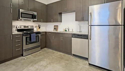 Modern Industrial Apartment with Skywalk - Photo 5