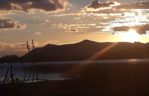 Casa na lagoa do Palmital com acesso à lagoa na propriedade e localizada apenas a 13 km da praia de Atlântida Sul e do Centro de Osório Lugar com Natureza-Wi-Fi 1 cama de casal e um beliche 2 solteiros - Foto 17
